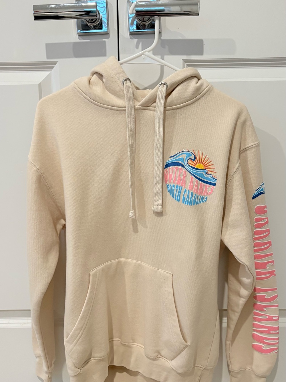 Cream Hooded Sweatshirt with Coastal Graphic